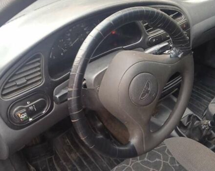 Бежевий Деу Ланос, об'ємом двигуна 1.5 л та пробігом 340 тис. км за 1400 $, фото 4 на Automoto.ua