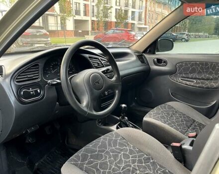 Бежевий Деу Ланос, об'ємом двигуна 1.5 л та пробігом 252 тис. км за 1650 $, фото 10 на Automoto.ua