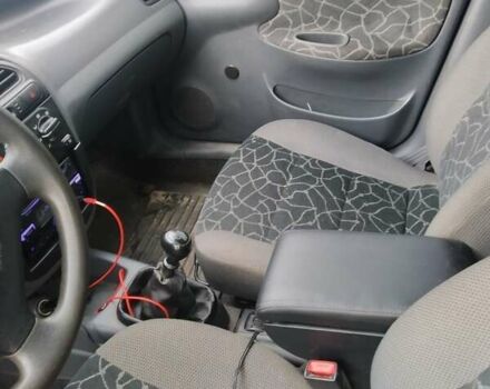 Бежевый Дэу Ланос, объемом двигателя 1.5 л и пробегом 170 тыс. км за 2600 $, фото 7 на Automoto.ua