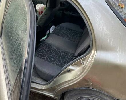 Бежевый Дэу Ланос, объемом двигателя 1.5 л и пробегом 260 тыс. км за 952 $, фото 11 на Automoto.ua