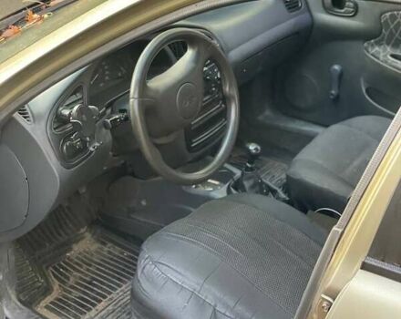 Бежевый Дэу Ланос, объемом двигателя 1.5 л и пробегом 260 тыс. км за 952 $, фото 12 на Automoto.ua