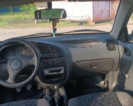 Бежевий Деу Ланос, об'ємом двигуна 1.5 л та пробігом 170 тис. км за 1999 $, фото 8 на Automoto.ua
