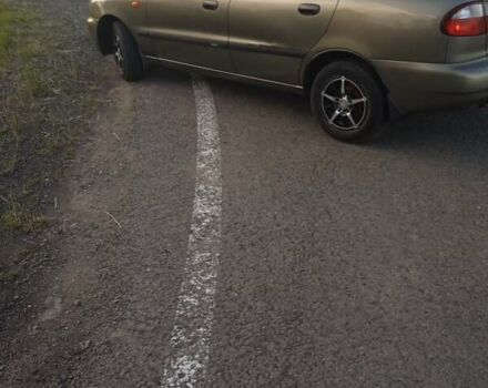 Бежевый Дэу Ланос, объемом двигателя 1.5 л и пробегом 281 тыс. км за 1500 $, фото 6 на Automoto.ua