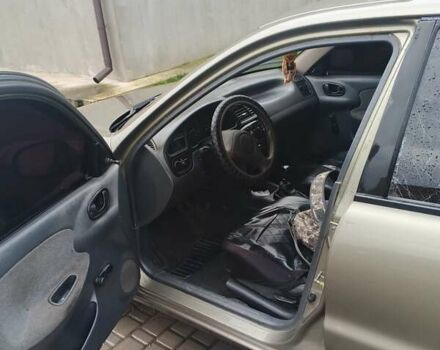 Бежевый Дэу Ланос, объемом двигателя 1.5 л и пробегом 286 тыс. км за 2100 $, фото 5 на Automoto.ua