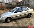 Бежевый Дэу Ланос, объемом двигателя 15 л и пробегом 220 тыс. км за 750 $, фото 1 на Automoto.ua