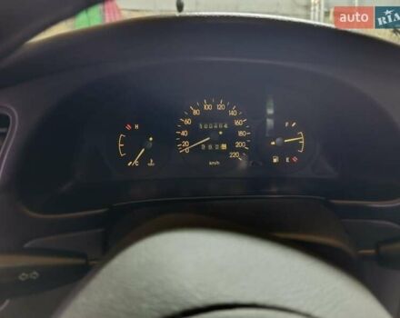 Бежевый Дэу Ланос, объемом двигателя 1.5 л и пробегом 180 тыс. км за 2250 $, фото 5 на Automoto.ua