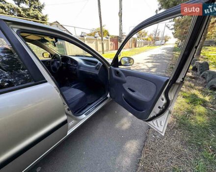 Бежевий Деу Ланос, об'ємом двигуна 1.5 л та пробігом 224 тис. км за 1650 $, фото 6 на Automoto.ua