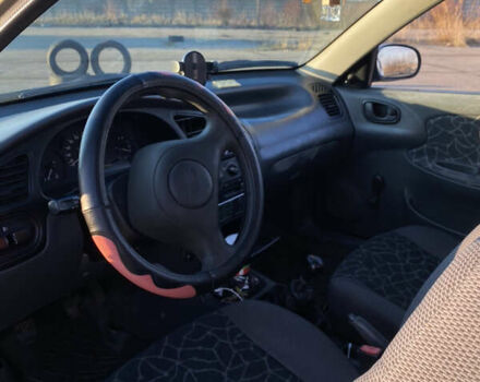 Бежевый Дэу Ланос, объемом двигателя 1.5 л и пробегом 265 тыс. км за 2200 $, фото 1 на Automoto.ua