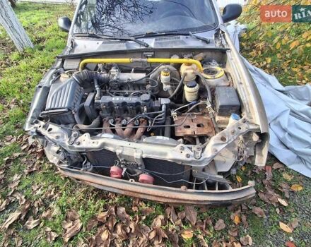 Бежевий Деу Ланос, об'ємом двигуна 1.5 л та пробігом 10 тис. км за 800 $, фото 6 на Automoto.ua