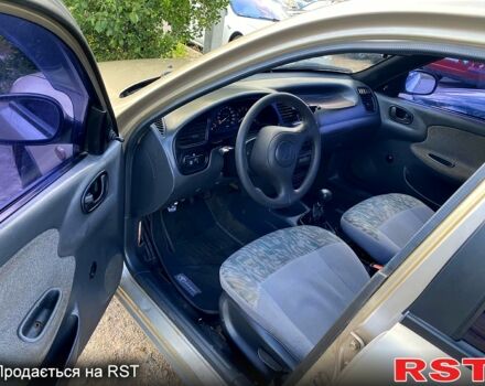 Бежевий Деу Ланос, об'ємом двигуна 1.5 л та пробігом 385 тис. км за 2300 $, фото 5 на Automoto.ua