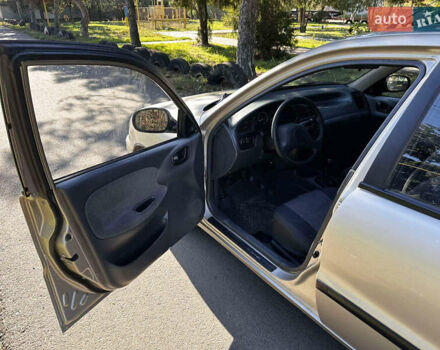 Бежевий Деу Ланос, об'ємом двигуна 1.5 л та пробігом 224 тис. км за 1650 $, фото 7 на Automoto.ua