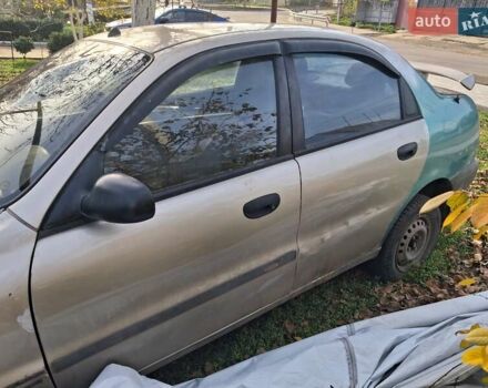 Бежевий Деу Ланос, об'ємом двигуна 1.5 л та пробігом 10 тис. км за 800 $, фото 7 на Automoto.ua