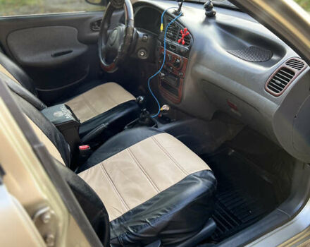 Бежевый Дэу Ланос, объемом двигателя 1.5 л и пробегом 350 тыс. км за 2700 $, фото 8 на Automoto.ua