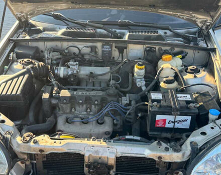 Бежевый Дэу Ланос, объемом двигателя 1.5 л и пробегом 200 тыс. км за 2250 $, фото 9 на Automoto.ua