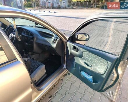 Бежевый Дэу Ланос, объемом двигателя 1.5 л и пробегом 353 тыс. км за 1700 $, фото 8 на Automoto.ua