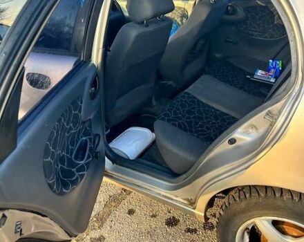 Бежевый Дэу Ланос, объемом двигателя 1.5 л и пробегом 200 тыс. км за 2200 $, фото 8 на Automoto.ua