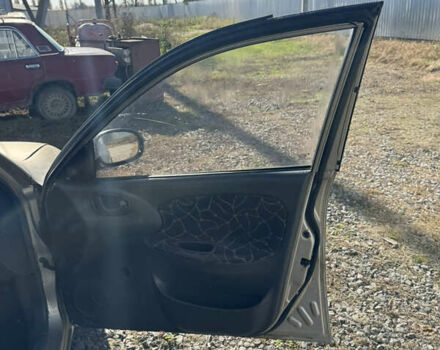 Бежевый Дэу Ланос, объемом двигателя 1.5 л и пробегом 250 тыс. км за 950 $, фото 15 на Automoto.ua