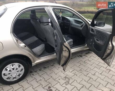 Бежевий Деу Ланос, об'ємом двигуна 1.5 л та пробігом 345 тис. км за 1800 $, фото 8 на Automoto.ua