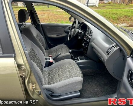 Бежевий Деу Ланос, об'ємом двигуна 1.3 л та пробігом 136 тис. км за 2650 $, фото 6 на Automoto.ua