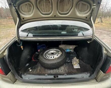 Бежевый Дэу Ланос, объемом двигателя 1.5 л и пробегом 265 тыс. км за 1999 $, фото 6 на Automoto.ua