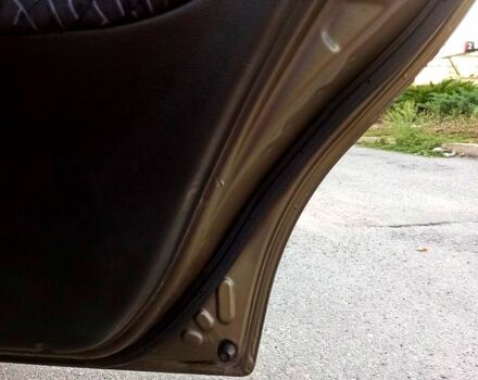 Бежевый Дэу Ланос, объемом двигателя 1.3 л и пробегом 210 тыс. км за 1950 $, фото 13 на Automoto.ua