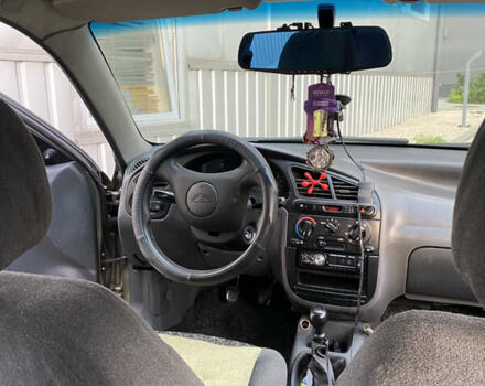 Бежевый Дэу Ланос, объемом двигателя 1.5 л и пробегом 250 тыс. км за 2300 $, фото 5 на Automoto.ua