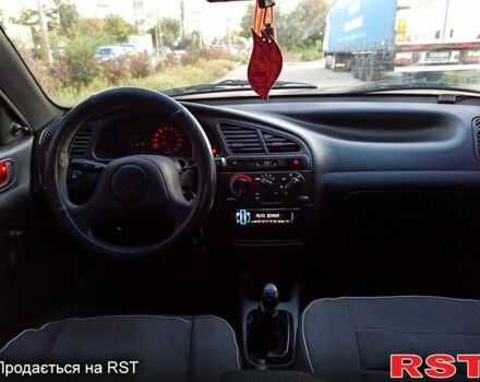 Бежевый Дэу Ланос, объемом двигателя 1.3 л и пробегом 210 тыс. км за 1950 $, фото 4 на Automoto.ua