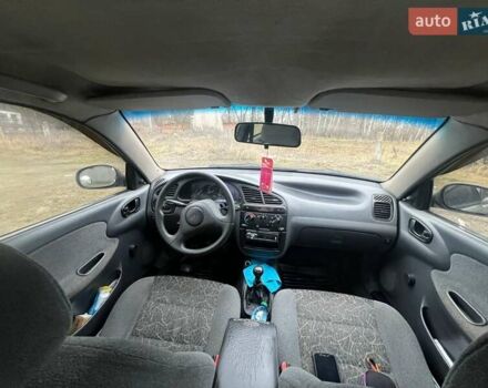 Бежевый Дэу Ланос, объемом двигателя 1.5 л и пробегом 265 тыс. км за 1999 $, фото 12 на Automoto.ua