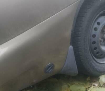 Бежевий Деу Ланос, об'ємом двигуна 1.5 л та пробігом 187 тис. км за 2000 $, фото 4 на Automoto.ua