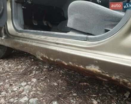 Бежевий Деу Ланос, об'ємом двигуна 1.5 л та пробігом 348 тис. км за 1450 $, фото 27 на Automoto.ua