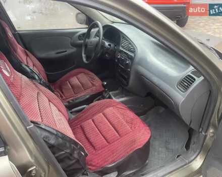 Бежевый Дэу Ланос, объемом двигателя 1.5 л и пробегом 777 тыс. км за 900 $, фото 11 на Automoto.ua