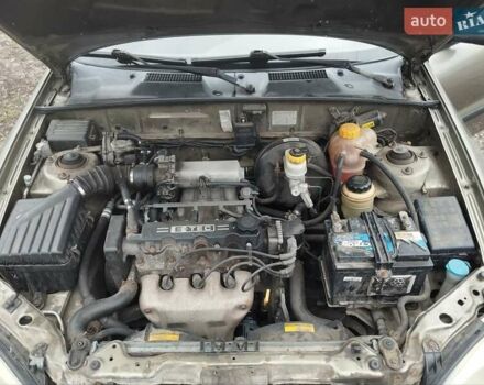 Бежевий Деу Ланос, об'ємом двигуна 1.5 л та пробігом 348 тис. км за 1450 $, фото 14 на Automoto.ua