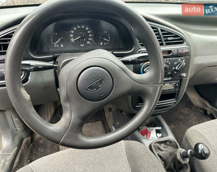 Бежевий Деу Ланос, об'ємом двигуна 1.5 л та пробігом 213 тис. км за 1800 $, фото 13 на Automoto.ua