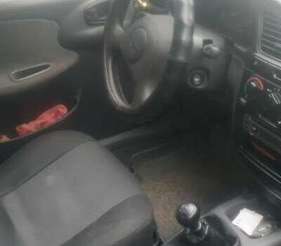 Бежевий Деу Ланос, об'ємом двигуна 1.5 л та пробігом 187 тис. км за 2000 $, фото 8 на Automoto.ua