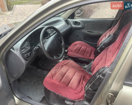 Бежевый Дэу Ланос, объемом двигателя 1.5 л и пробегом 777 тыс. км за 900 $, фото 16 на Automoto.ua