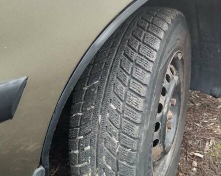 Бежевий Деу Ланос, об'ємом двигуна 1.5 л та пробігом 348 тис. км за 1450 $, фото 13 на Automoto.ua