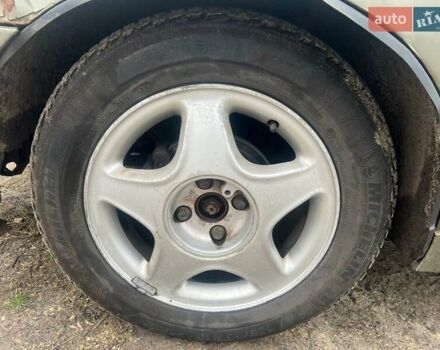 Бежевый Дэу Ланос, объемом двигателя 1.5 л и пробегом 265 тыс. км за 1999 $, фото 4 на Automoto.ua