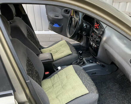 Бежевый Дэу Ланос, объемом двигателя 1.5 л и пробегом 250 тыс. км за 2300 $, фото 3 на Automoto.ua