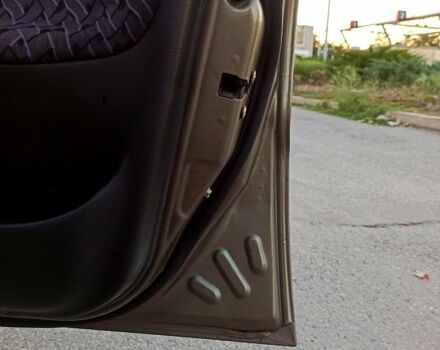 Бежевый Дэу Ланос, объемом двигателя 1.3 л и пробегом 210 тыс. км за 1950 $, фото 12 на Automoto.ua