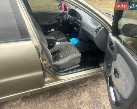 Бежевый Дэу Ланос, объемом двигателя 1.5 л и пробегом 265 тыс. км за 1999 $, фото 14 на Automoto.ua