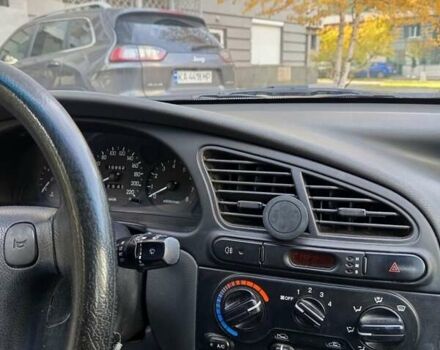 Бежевый Дэу Ланос, объемом двигателя 1.5 л и пробегом 159 тыс. км за 2350 $, фото 4 на Automoto.ua