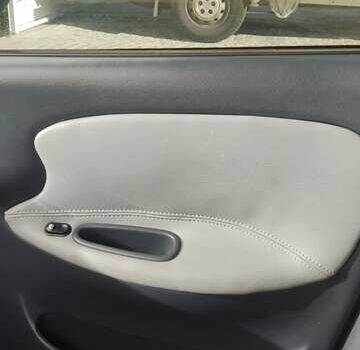 Бежевий Деу Ланос, об'ємом двигуна 1.5 л та пробігом 89 тис. км за 2200 $, фото 7 на Automoto.ua