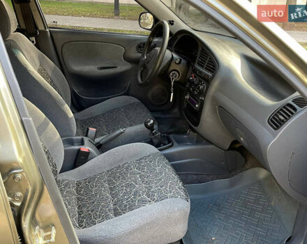 Бежевий Деу Ланос, об'ємом двигуна 1.5 л та пробігом 99 тис. км за 3350 $, фото 10 на Automoto.ua