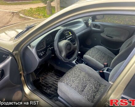 Бежевий Деу Ланос, об'ємом двигуна 1.5 л та пробігом 195 тис. км за 1999 $, фото 10 на Automoto.ua