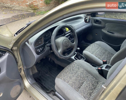 Бежевый Дэу Ланос, объемом двигателя 1.5 л и пробегом 195 тыс. км за 1899 $, фото 6 на Automoto.ua