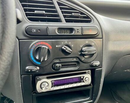 Бежевый Дэу Ланос, объемом двигателя 1.6 л и пробегом 225 тыс. км за 2499 $, фото 13 на Automoto.ua