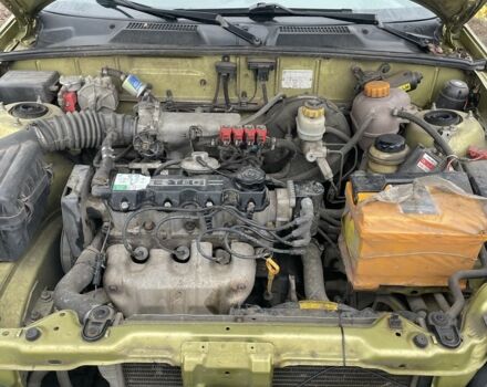 Бежевый Дэу Ланос, объемом двигателя 1.5 л и пробегом 250 тыс. км за 1900 $, фото 6 на Automoto.ua