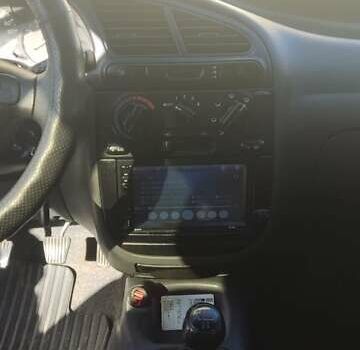 Бежевий Деу Ланос, об'ємом двигуна 1.5 л та пробігом 89 тис. км за 2200 $, фото 1 на Automoto.ua