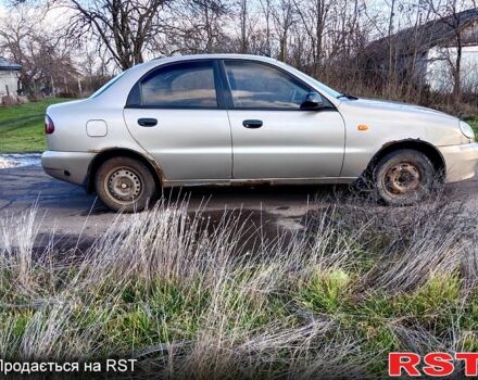 Бежевый Дэу Ланос, объемом двигателя 1.5 л и пробегом 208 тыс. км за 1300 $, фото 6 на Automoto.ua