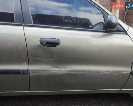 Бежевый Дэу Ланос, объемом двигателя 1.5 л и пробегом 177 тыс. км за 2000 $, фото 6 на Automoto.ua